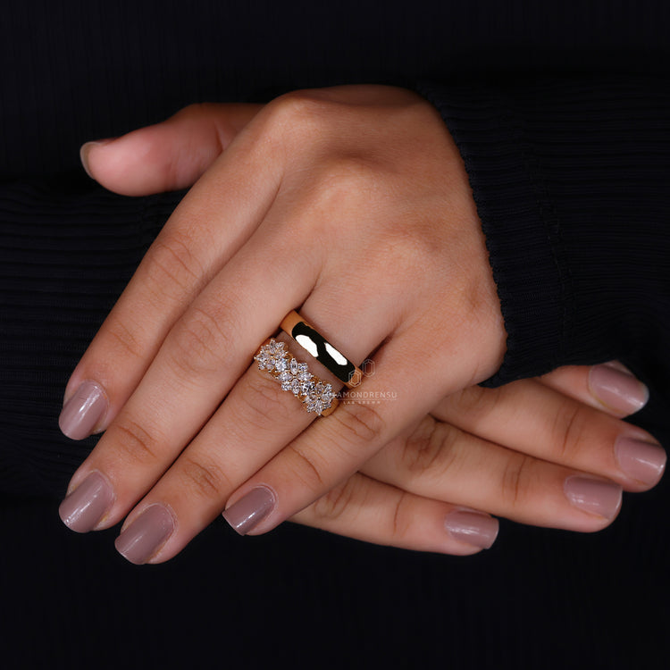 Cuff adjustable ring paired with floral diamond ring.