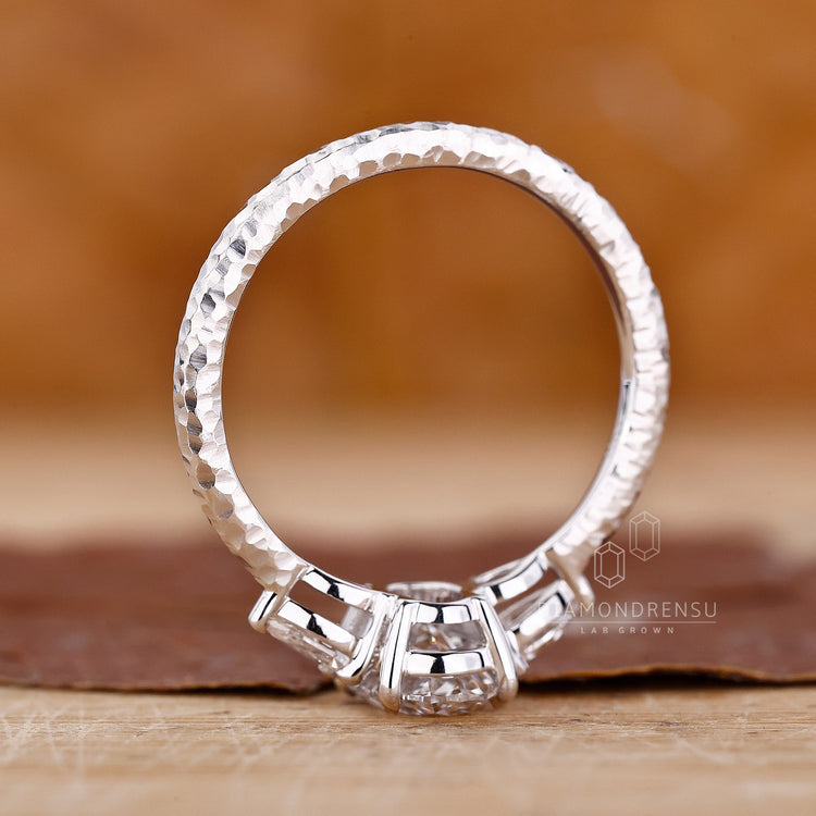 3 Stone Diamond Engagement Ring with hammer finish shank ring.