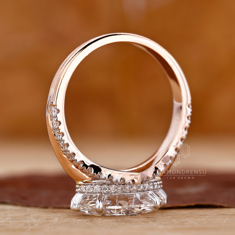 East west engagement ring in white and rose gold from Diamondrensu UK.