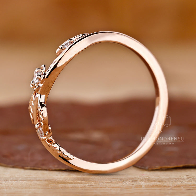 Handmade jewellery with rose gold and prong set diamonds.