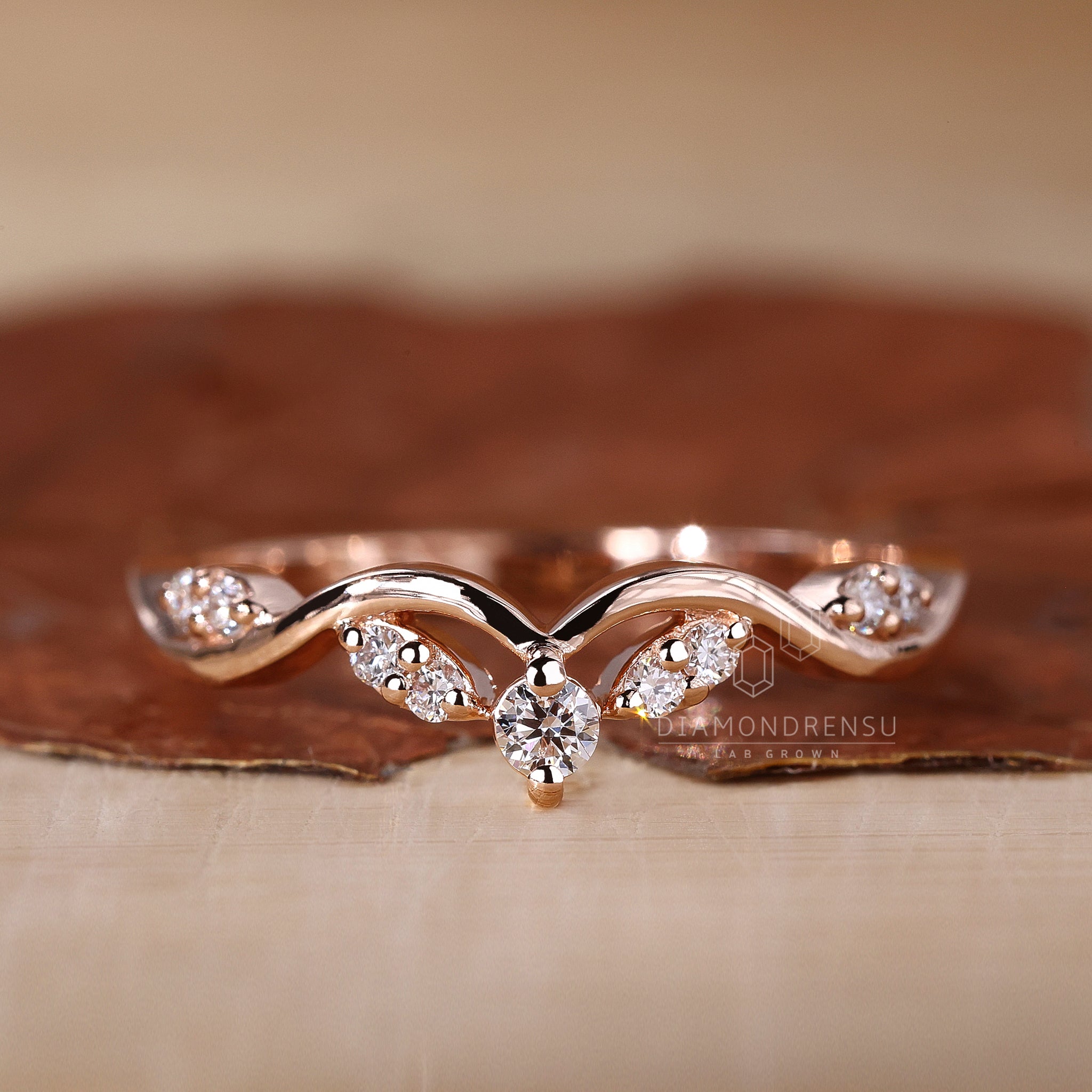 Lab grown diamond curved wedding band UK.