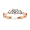 Infinity engagement ring with 3 round cut lab grown diamonds.