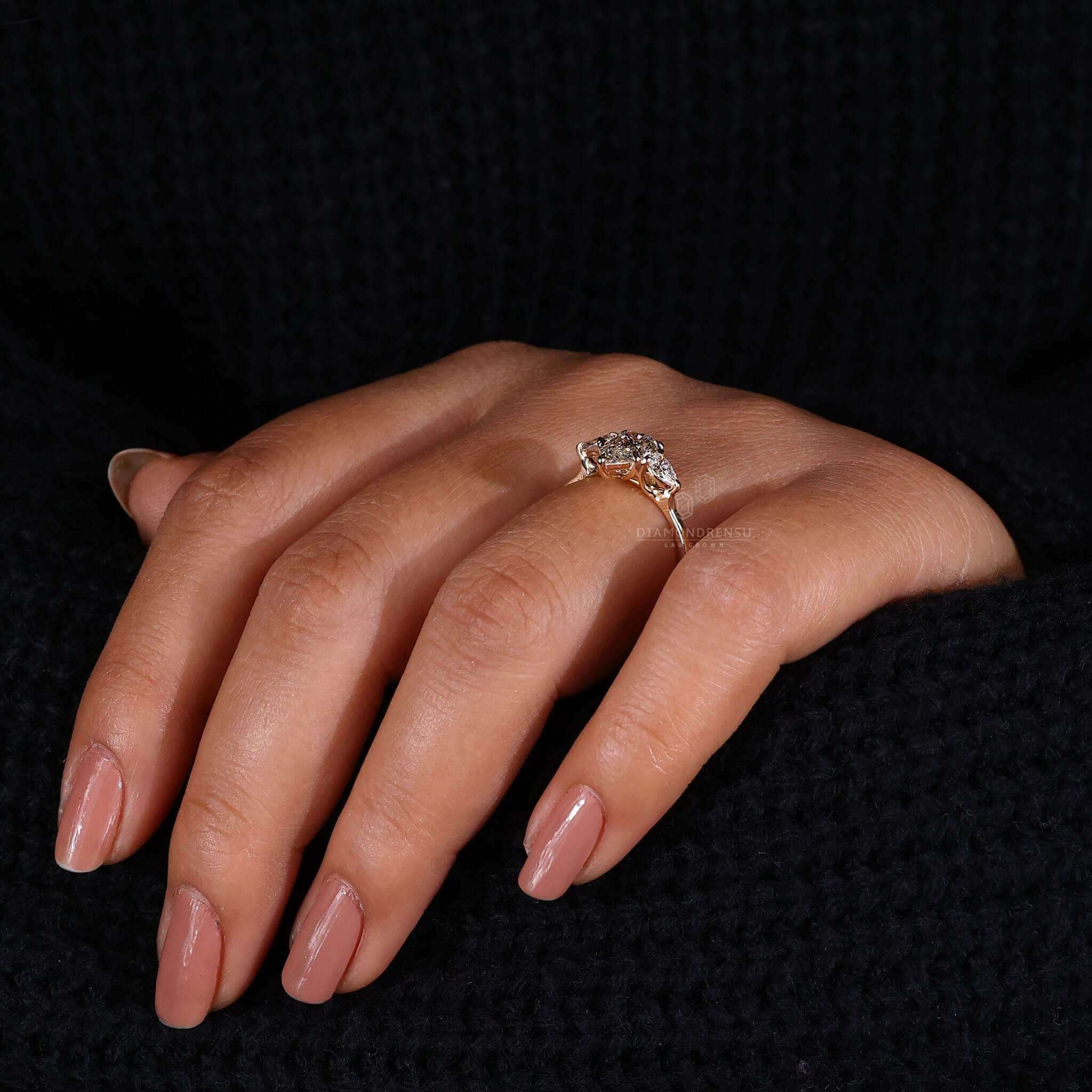 Engagement ring for women featuring a pear cut ring design.