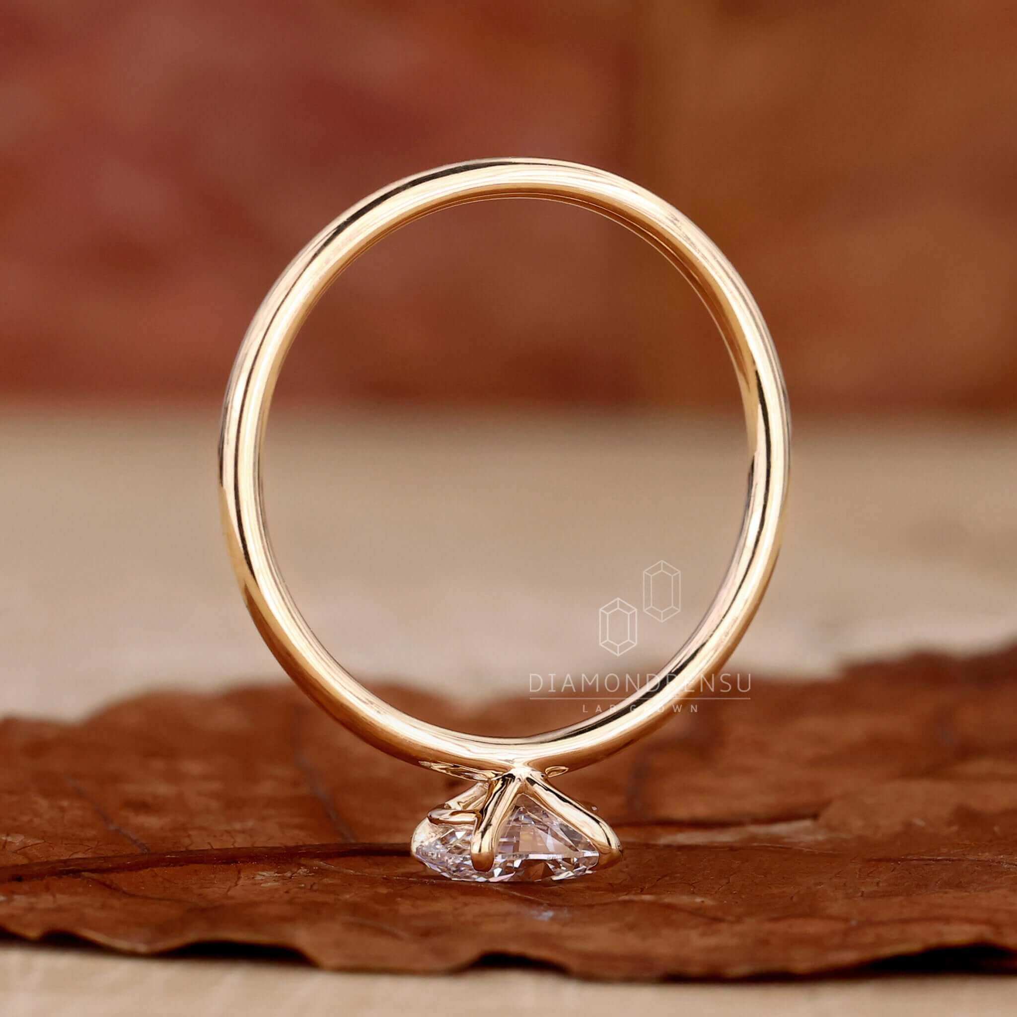 Solitaire engagement ring diamond paired with an east west engagement ring design, perfect for special milestones.