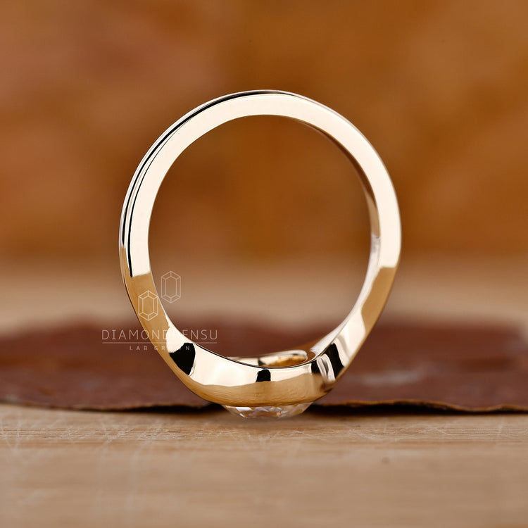 Yellow gold solitaire ring with rose cut diamond centre.