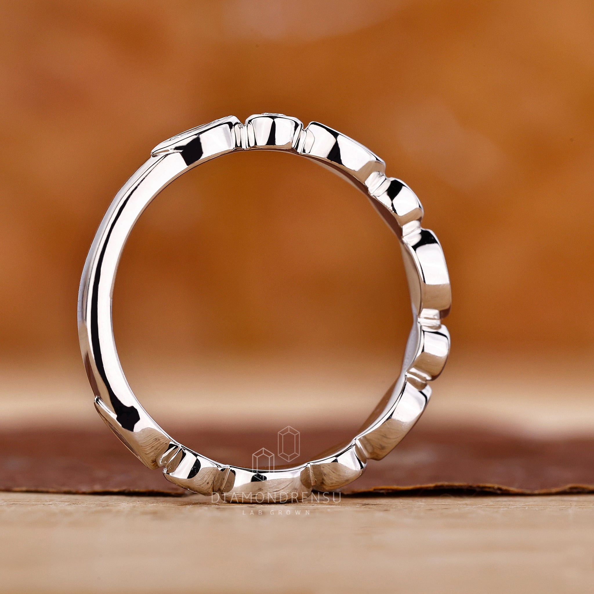 Handmade jewellery in white gold with bezel set accents.