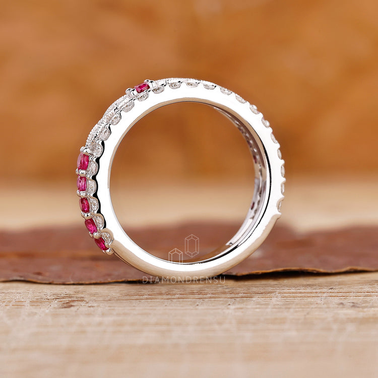 Custom diamond band with marquise outline and milgrain finish.