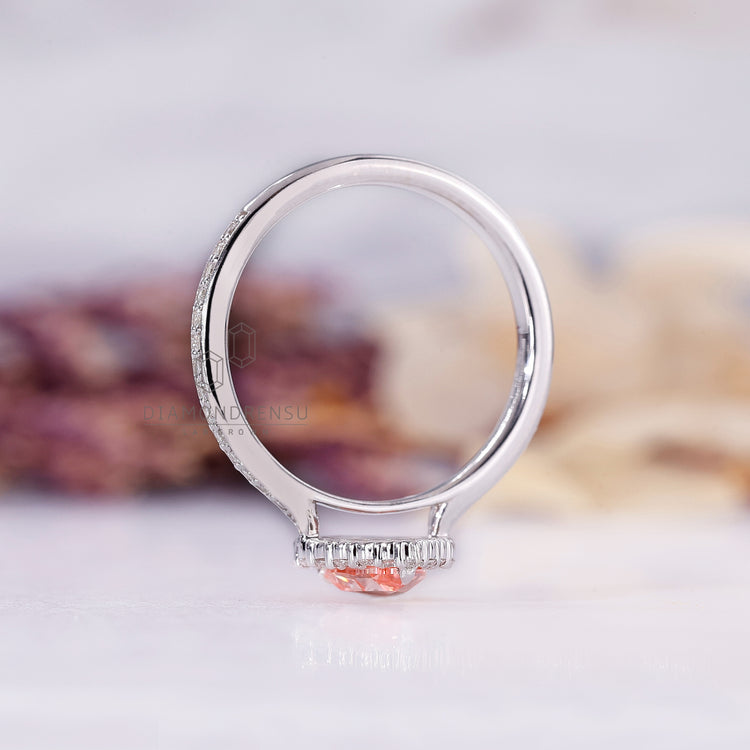 Pave setting ring with round cut halo in white gold and IGI certified.