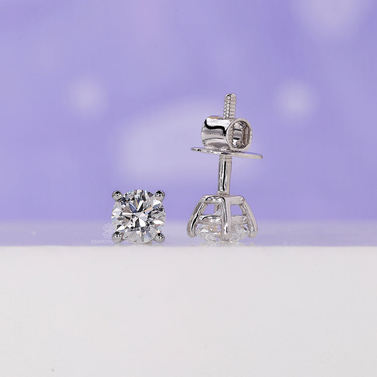 White gold handmade earrings set with brilliant lab grown diamonds.