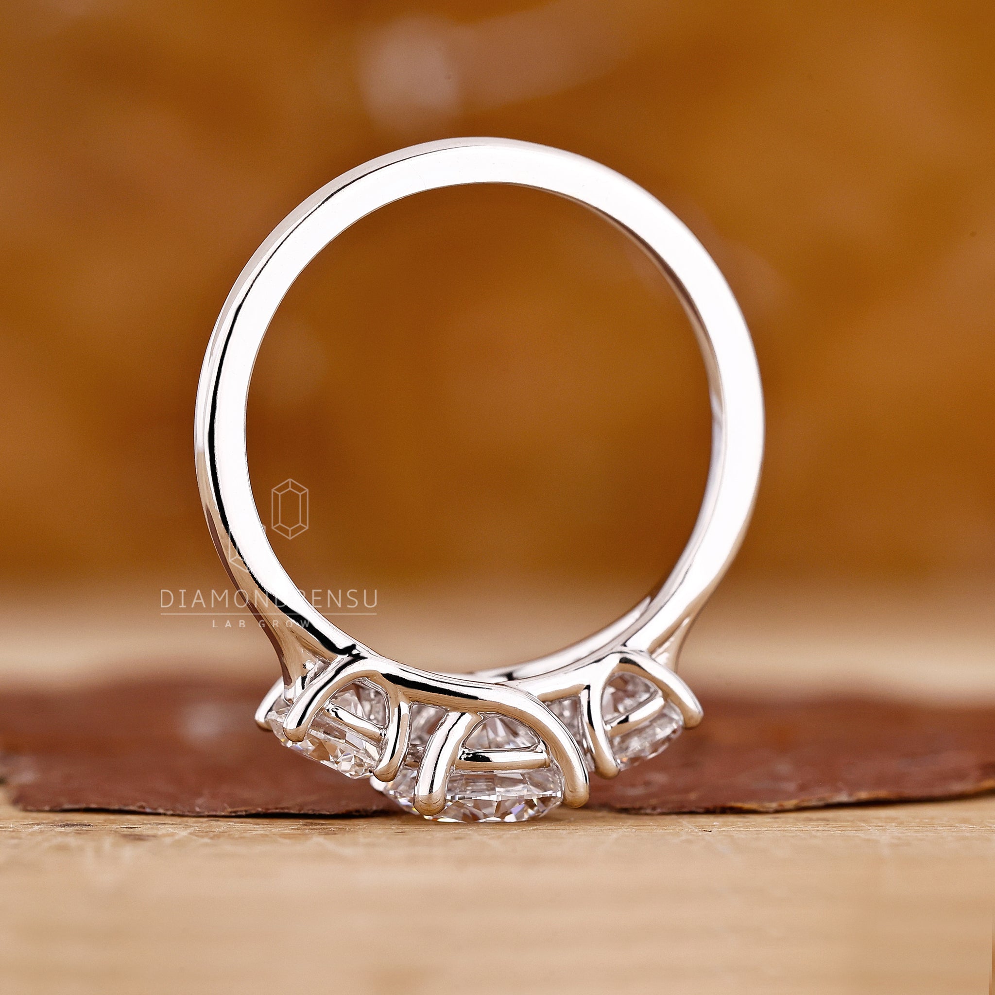 Three stone round diamond engagement ring from Diamondrensu UK.