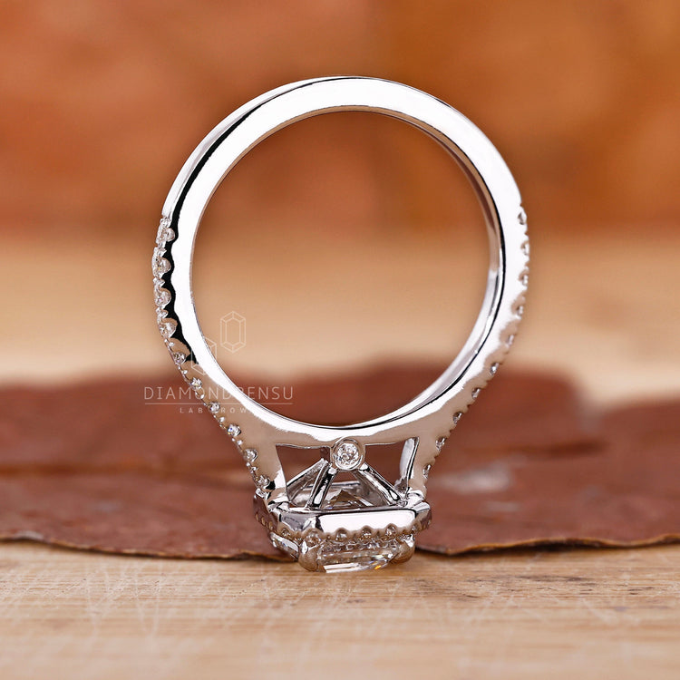 Unique engagement ring featuring an asscher cut diamond with a cathedral ring design and Lab Grown Diamond.