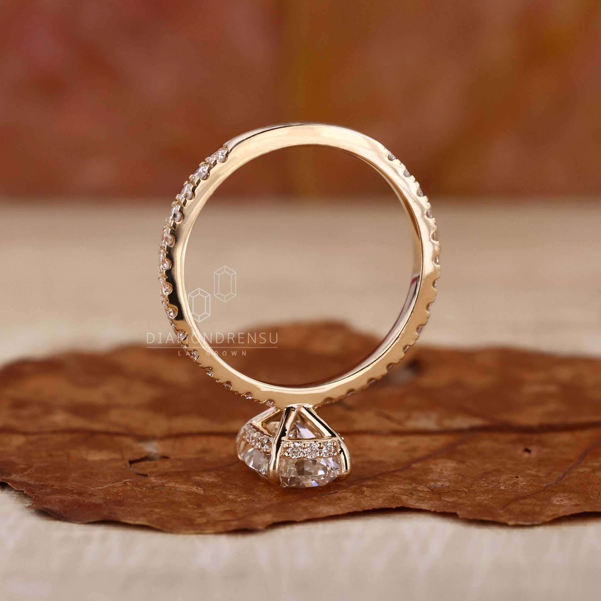 Pave set ring paired with a claw prong ring for an elegant finish.