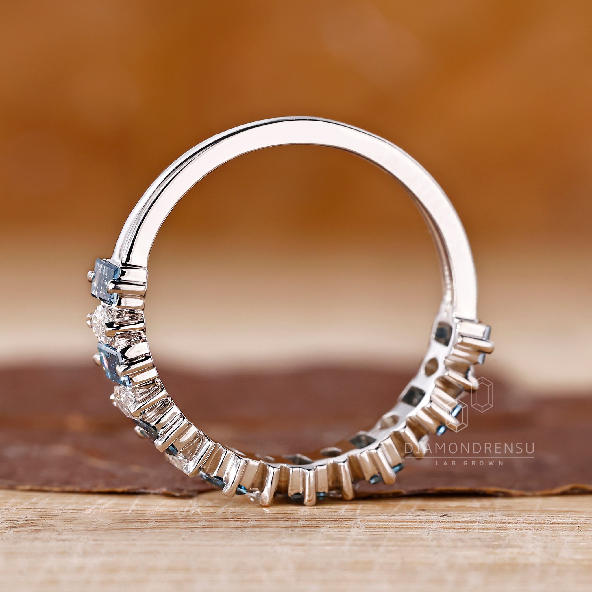 Handmade band from Diamondrensu UK featuring marquise and baguette diamonds.