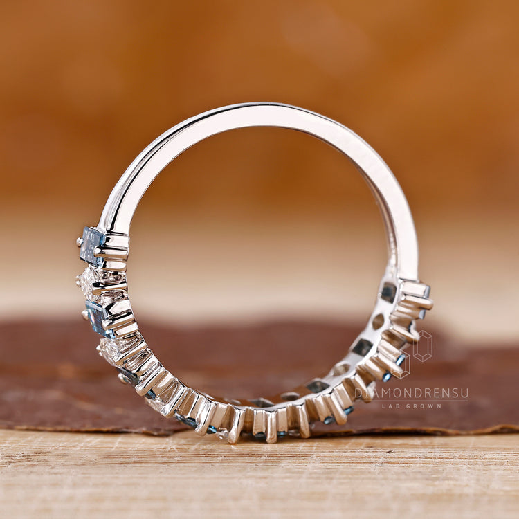 Handmade band from Diamondrensu UK featuring marquise and baguette diamonds.