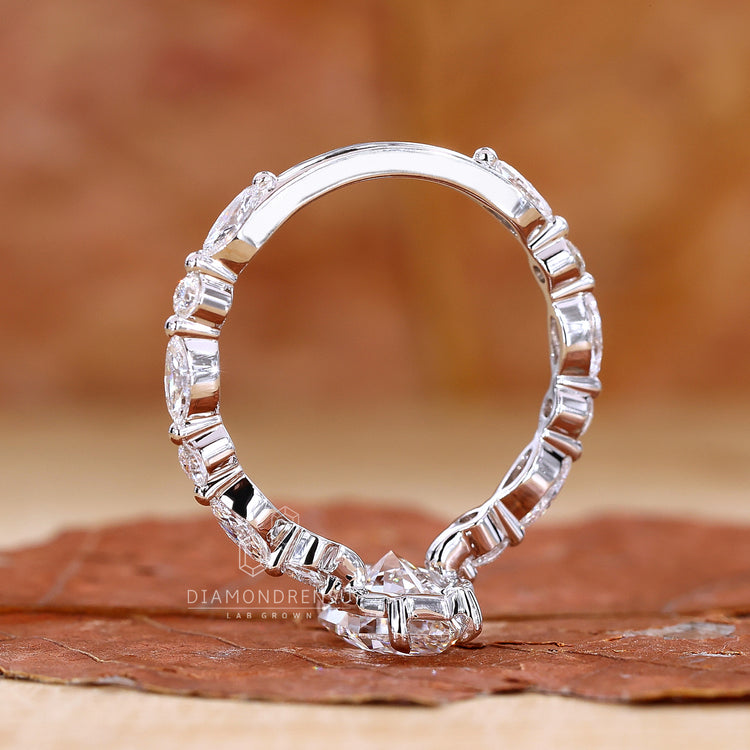 Lab Grown Diamond Dutch marquise ring with round side stones.