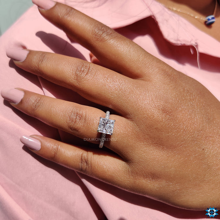 3 sided pave engagement ring with hidden accents and round pave band.