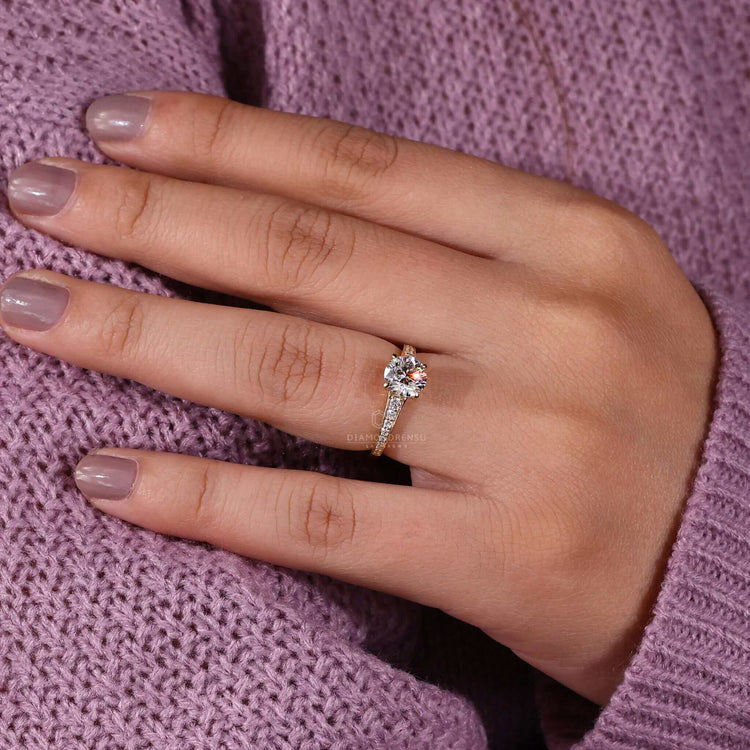 Tapered band engagement ring with a pave setting and a round diamond ring, perfect for UK engagement ring styles.