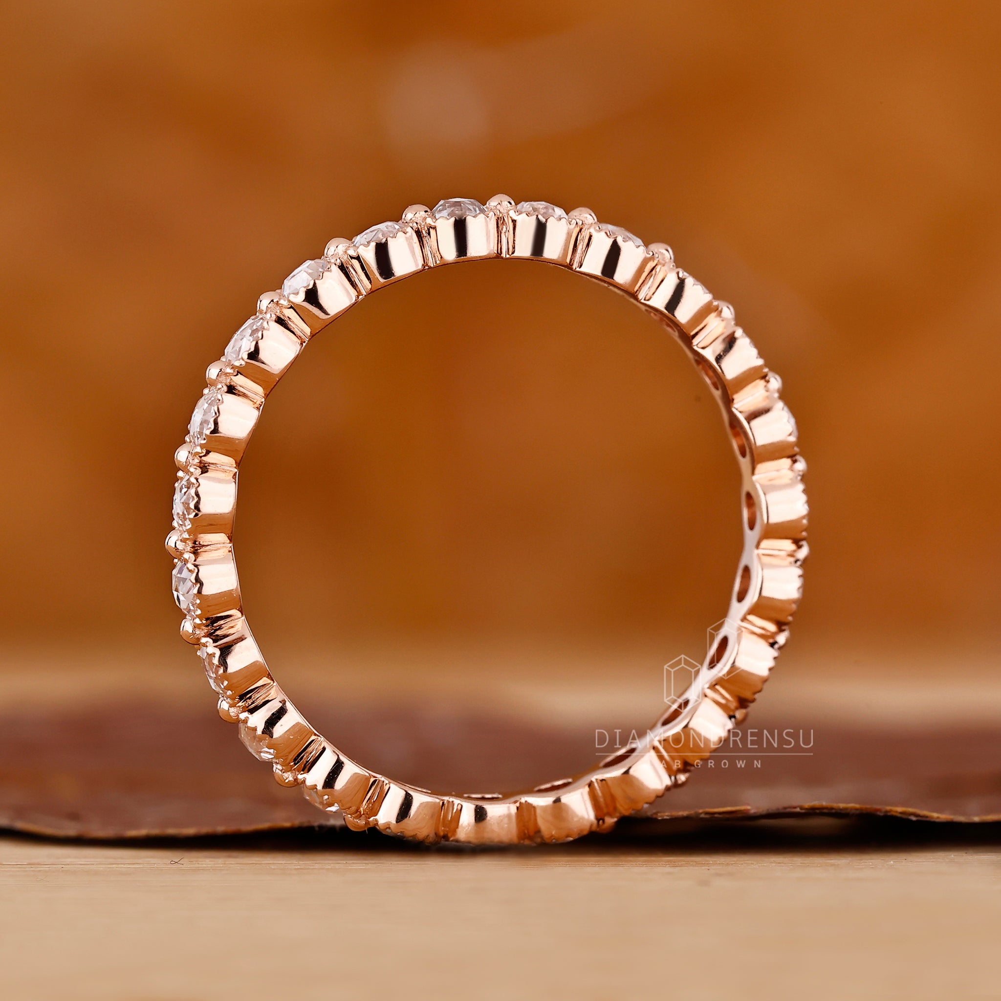 Lab grown diamond wedding band with milgrain edging.