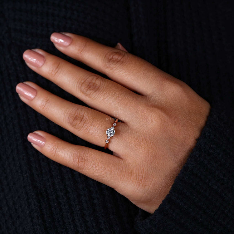 Five stone diamond ring with round brilliant cut diamonds, perfect as a uk engagement ring for women.