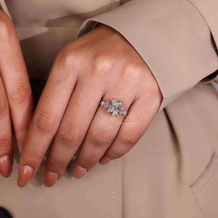 UK engagement ring is styled using radiant and round cuts.