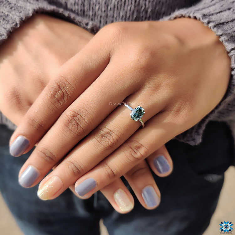 White gold ring with solitaire engagement ring