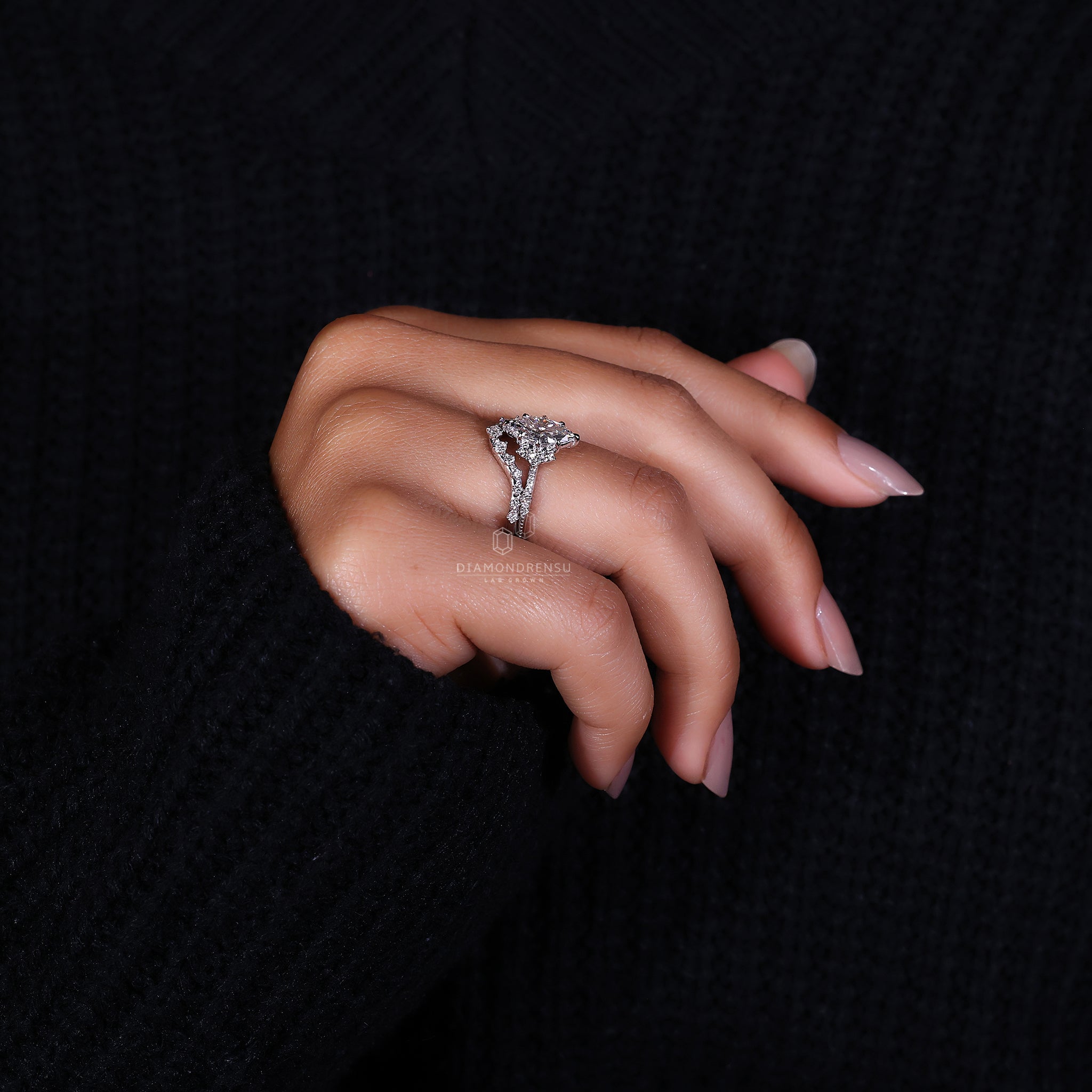 Claw prong ring with marquise diamond ring and tiara diamond band.