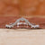 Curved wedding ring with round diamonds.
 Curved wedding ring with round diamonds.