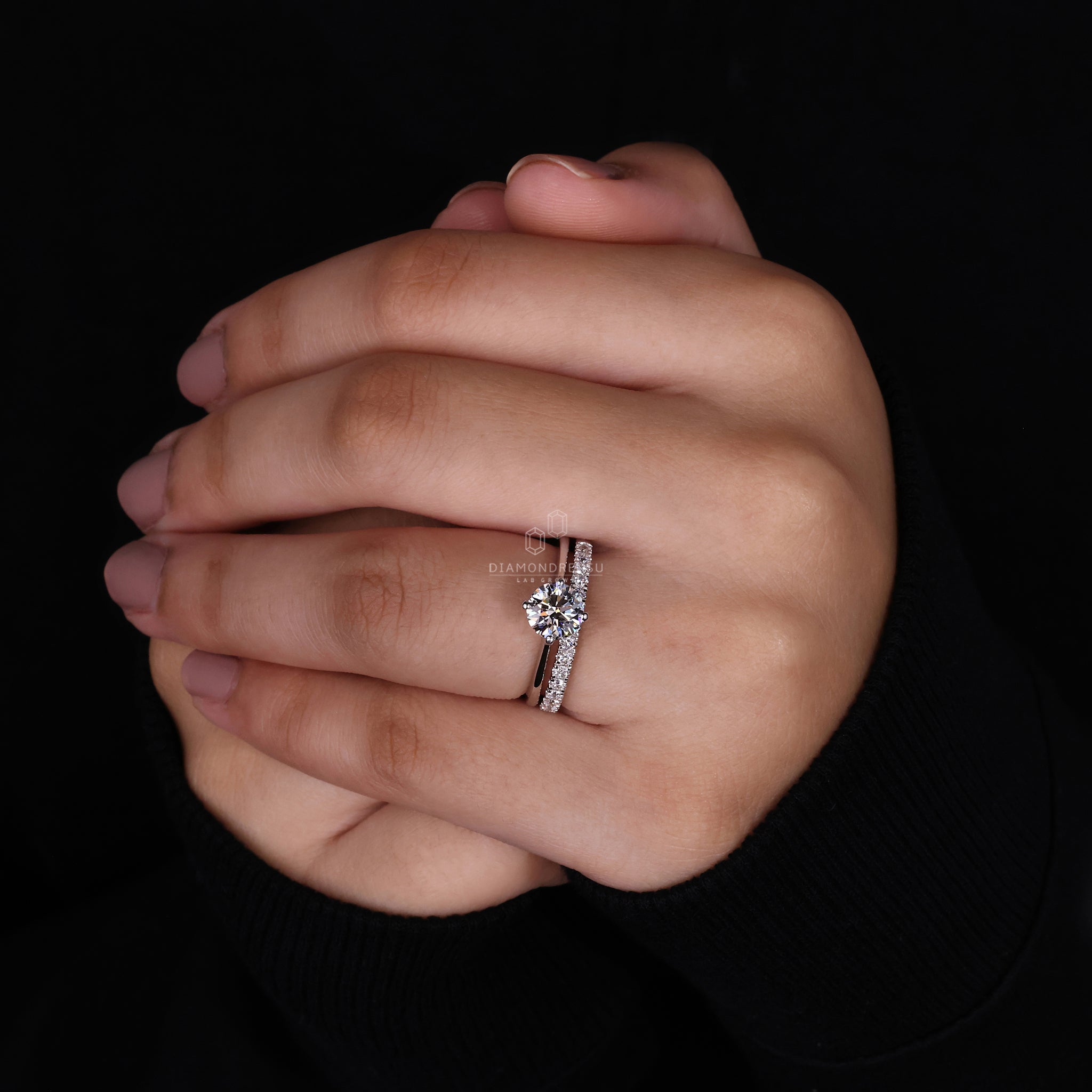 White gold bridal set with round diamond band and half eternity design.