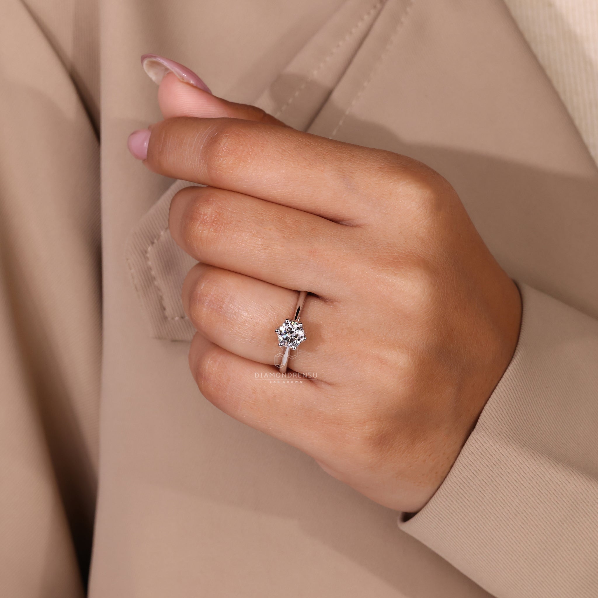 Hidden blue diamond ring crafted in white gold by Diamondrensu UK.