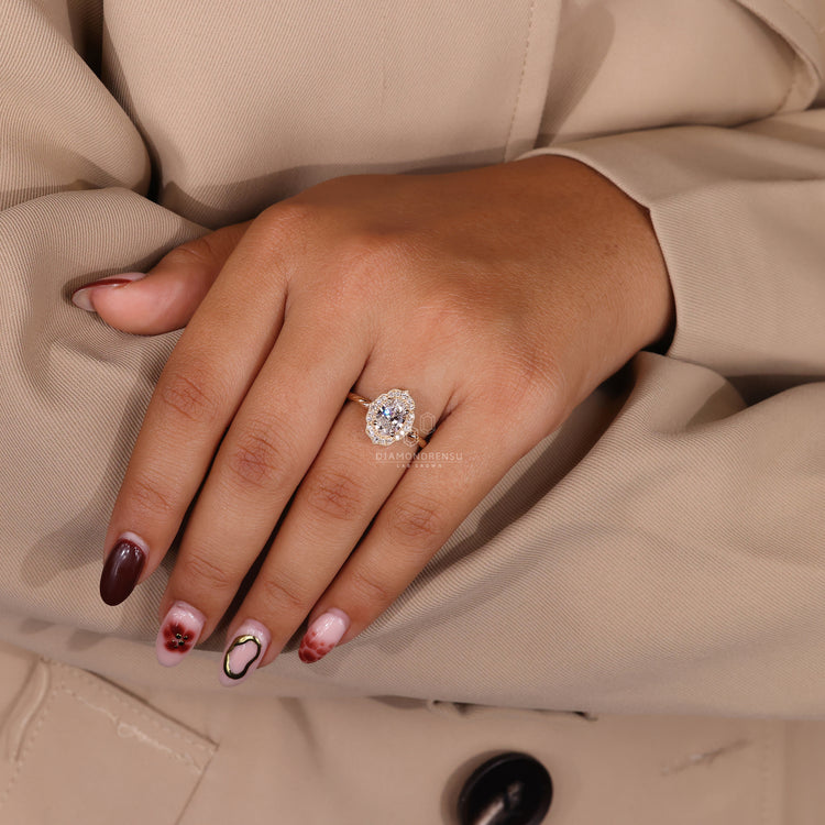 Round diamond ring and oval diamond are set together in a twisted rope setting ring.