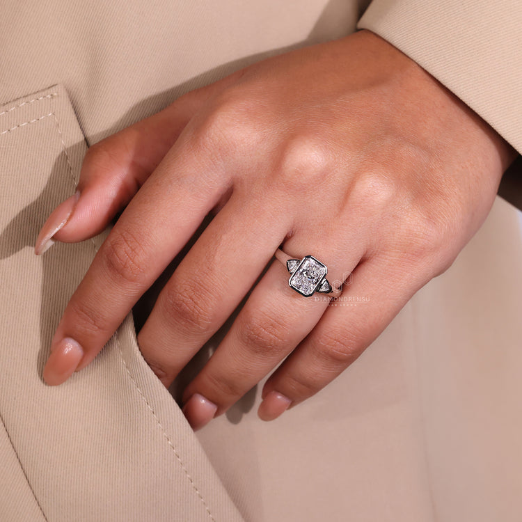 Custom engagement ring designed with a radiant center diamond.