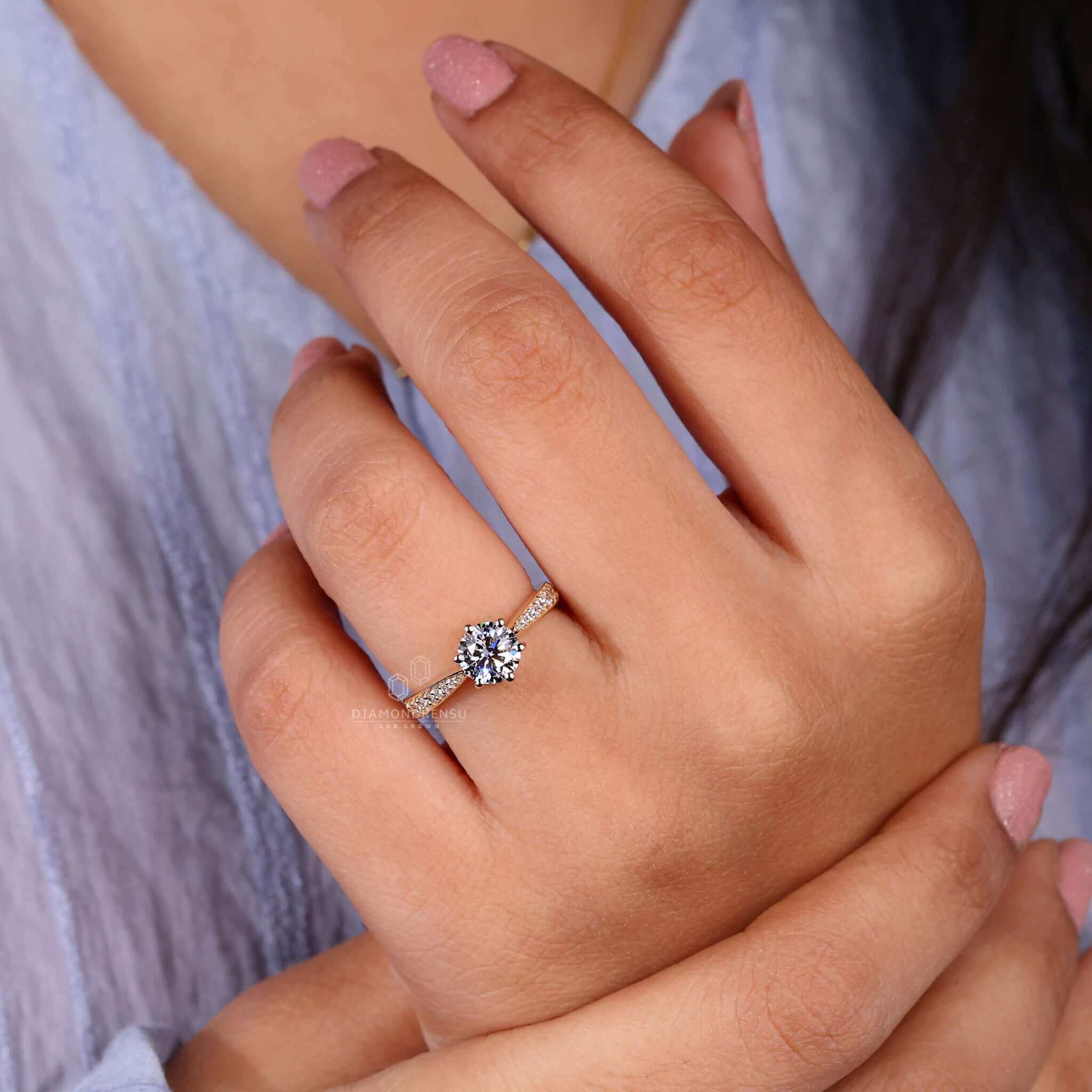 2 carat round diamond ring crafted in a six prong engagement ring setting for brilliance.