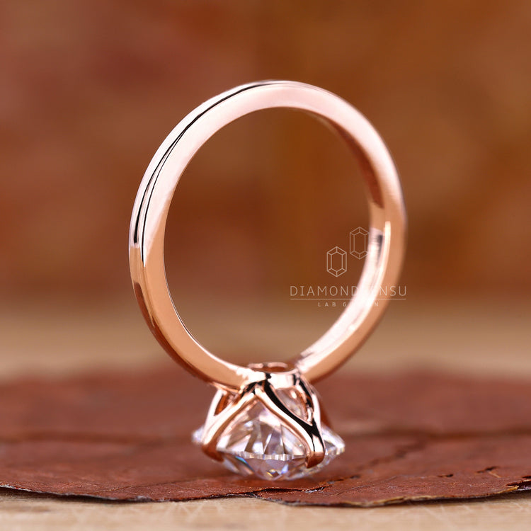 Handmade ring featuring compass prong ring