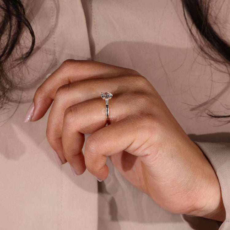 Baguette diamond ring with an oval shaped engagement ring style, perfect for unique engagement ring lovers.