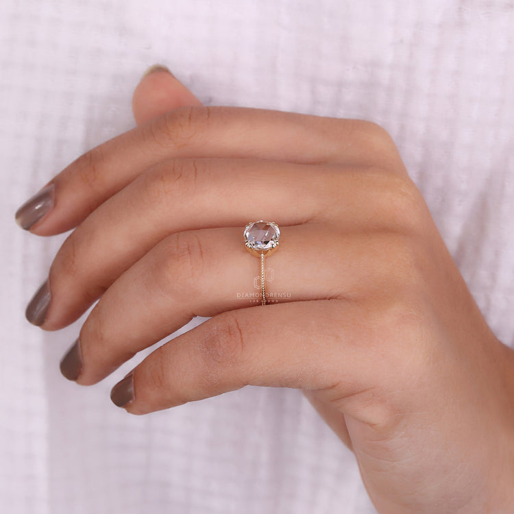 Custom engagement ring featuring round rose cut diamond and milgrain details.