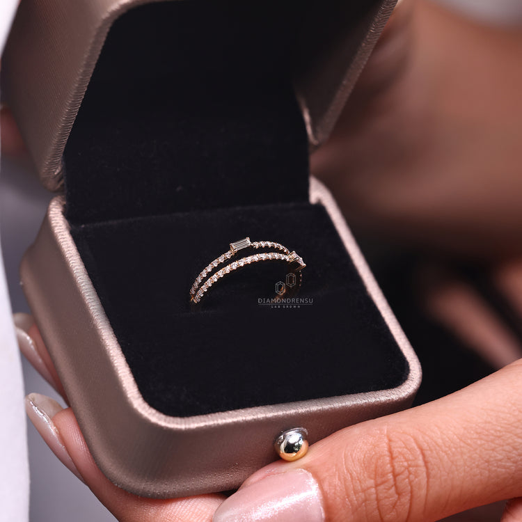 Round cut diamond band in a half eternity style.