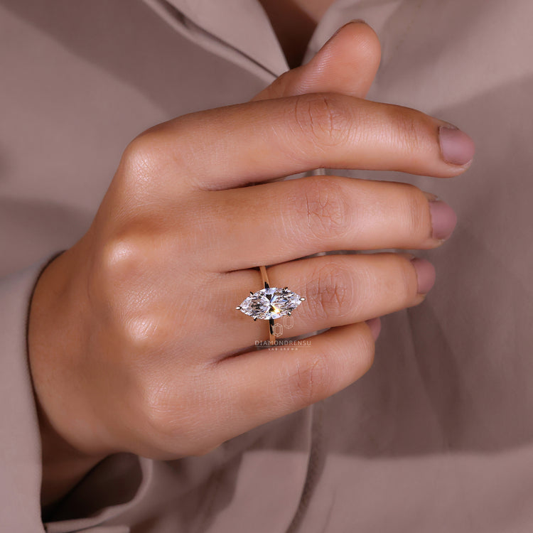 6 claw prong setting marquise diamond ring.