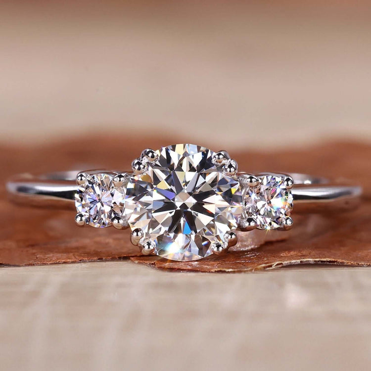Round diamond ring crafted with a round brilliant cut diamond in a classic white gold engagement ring setting.