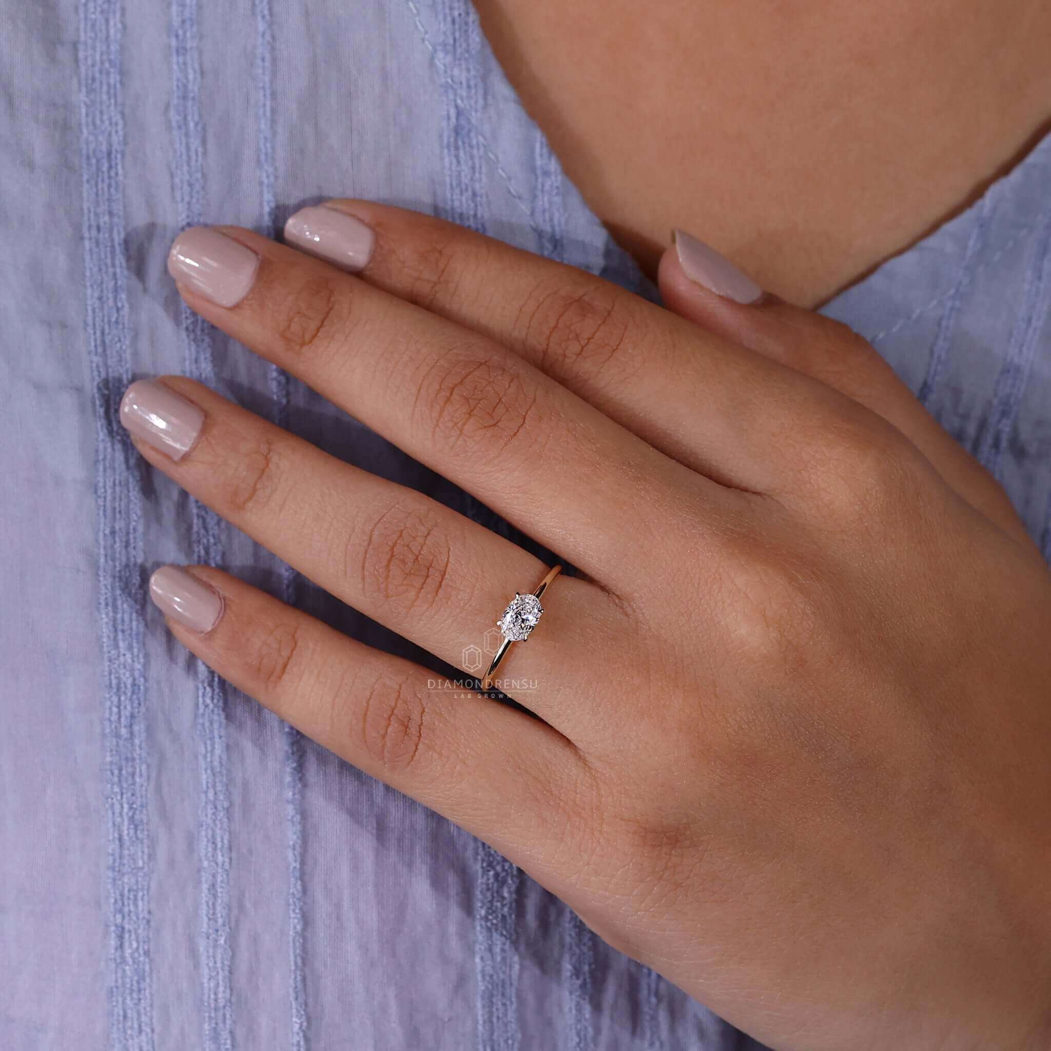Oval engagement ring with Lab Grown Diamond, igi certified, offering sustainable luxury and unmatched brilliance.