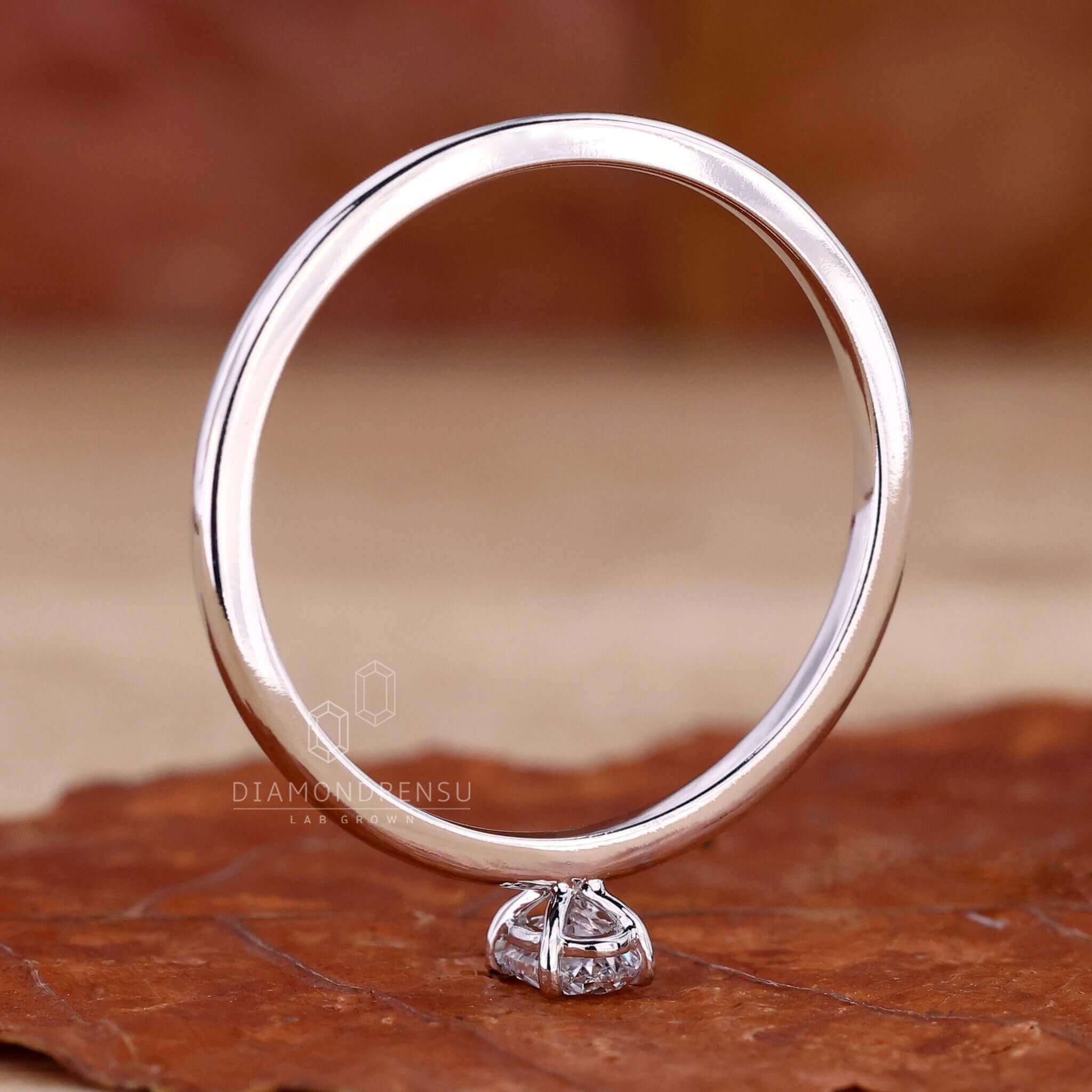 Oval engagement ring in a 4 prong diamond ring setting, handcrafted with precision for UK engagement traditions.
