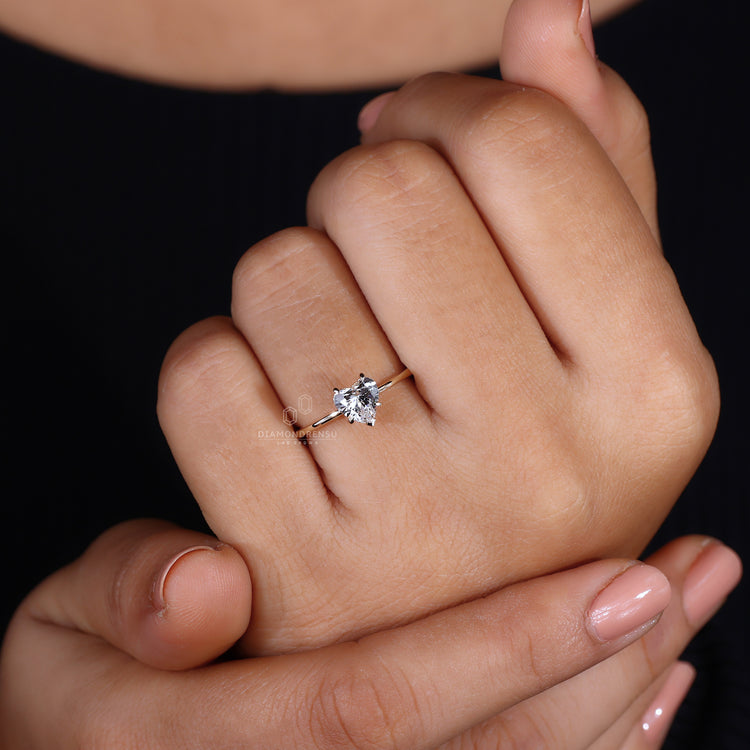 Heart cut diamond ring with solitaire setting.