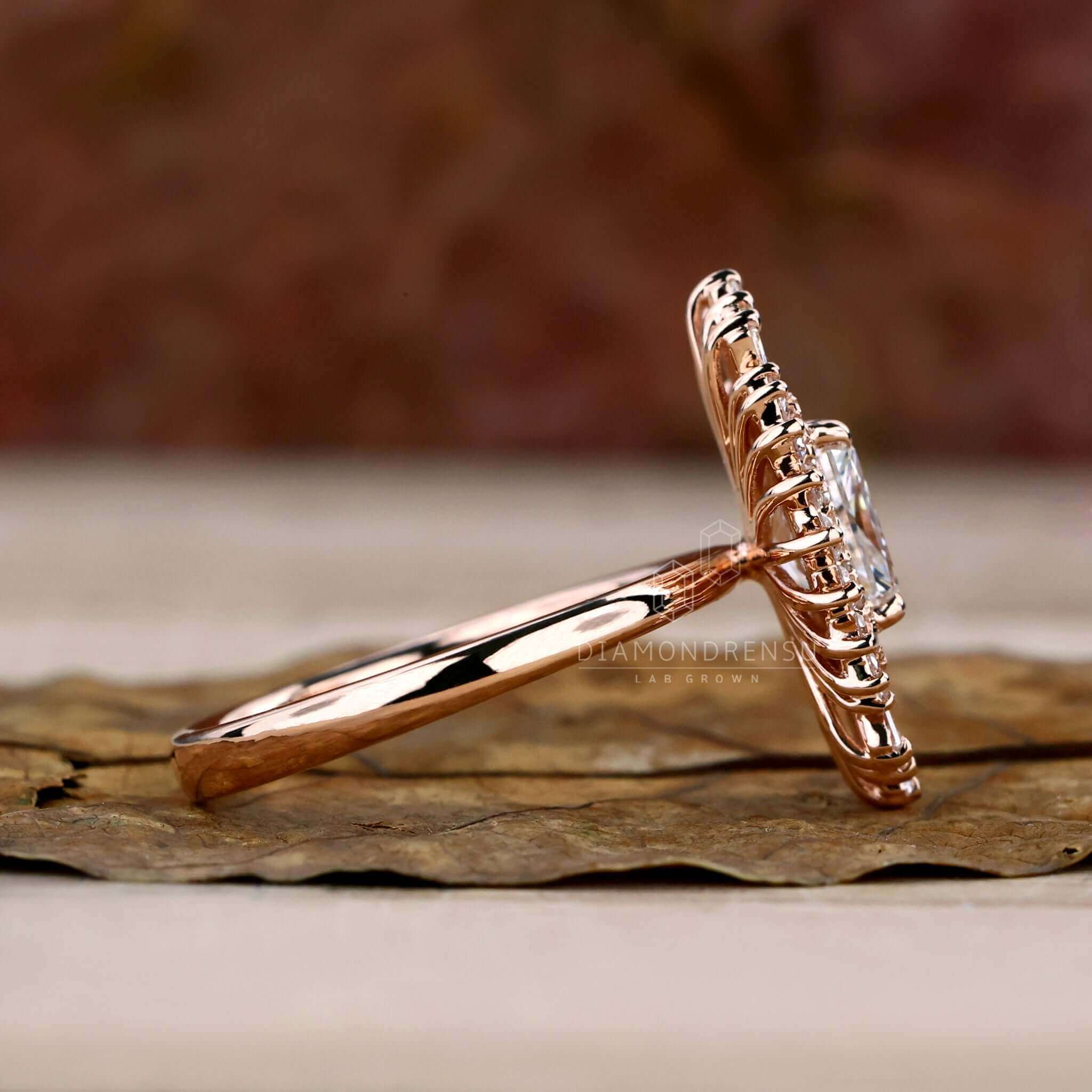 Diamond ring with tapered baguettes and a halo design for extra sparkle