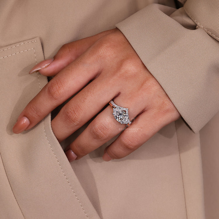 V shaped ring with custom prong setting and handmade jewellery style.