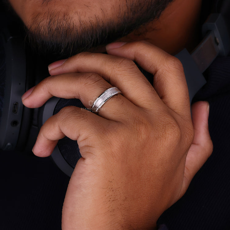 Unique diamond mens ring in white gold with a sleek brushed finish.