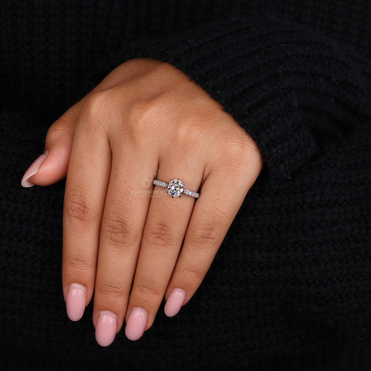 Pave diamond ring with old mine cushion cut centre and IGI certified lab diamond.