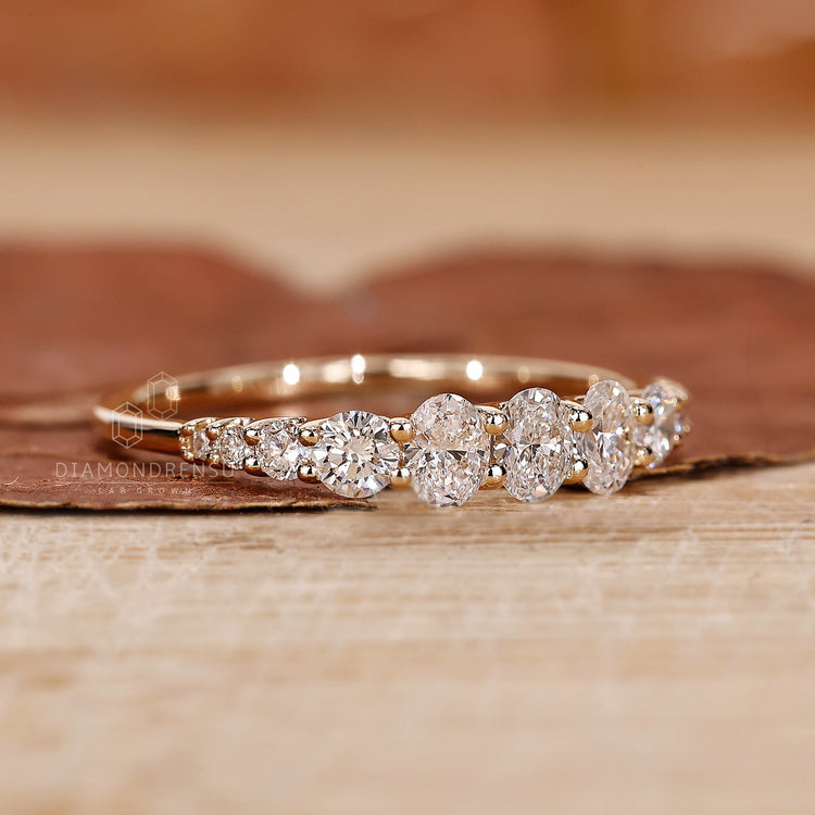 Half eternity diamond band with prong setting.