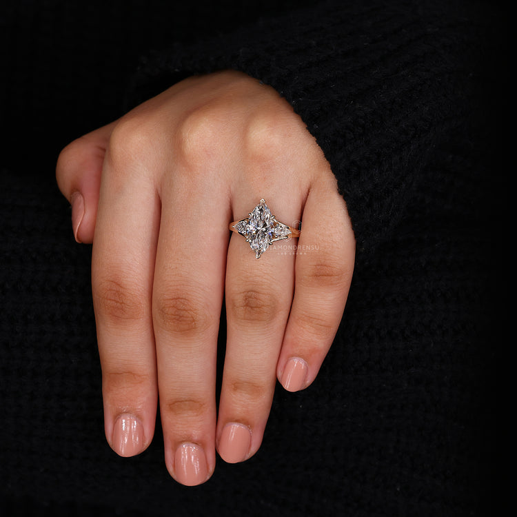 Pear side stones held by 6 prong setting.