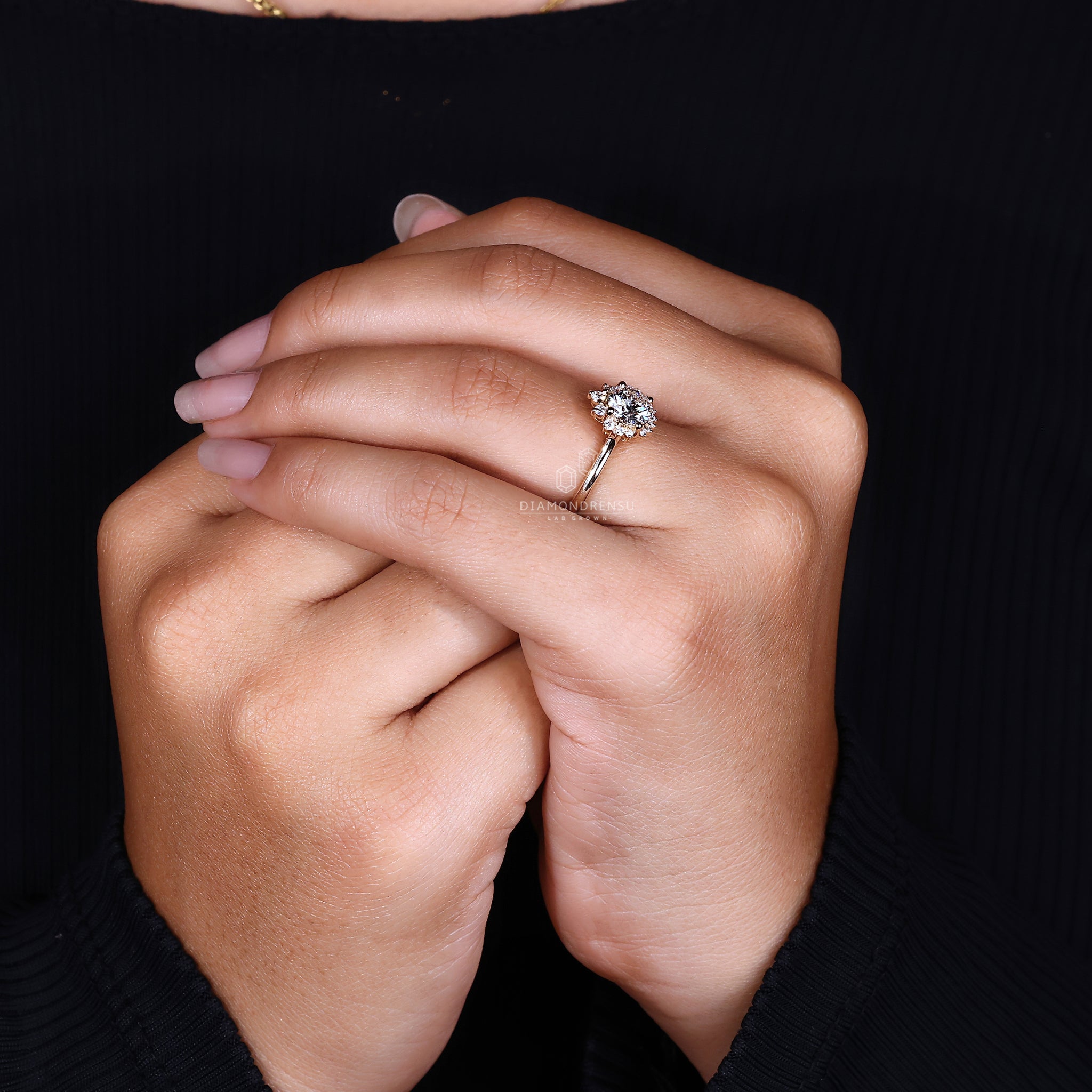 Halo ring setting placed in engagement ring yellow gold.