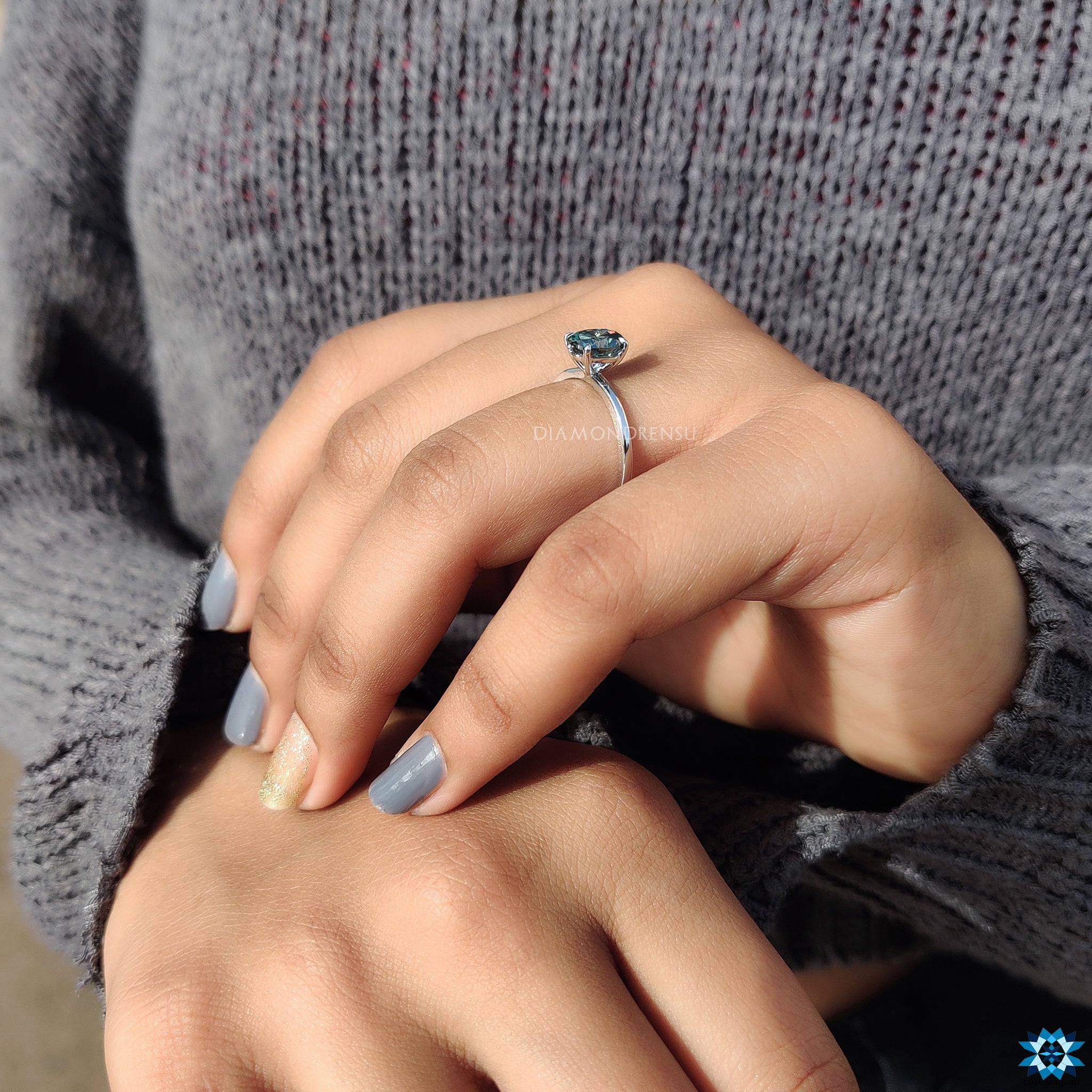 Prong setting ring with cyan blue moissanite ring