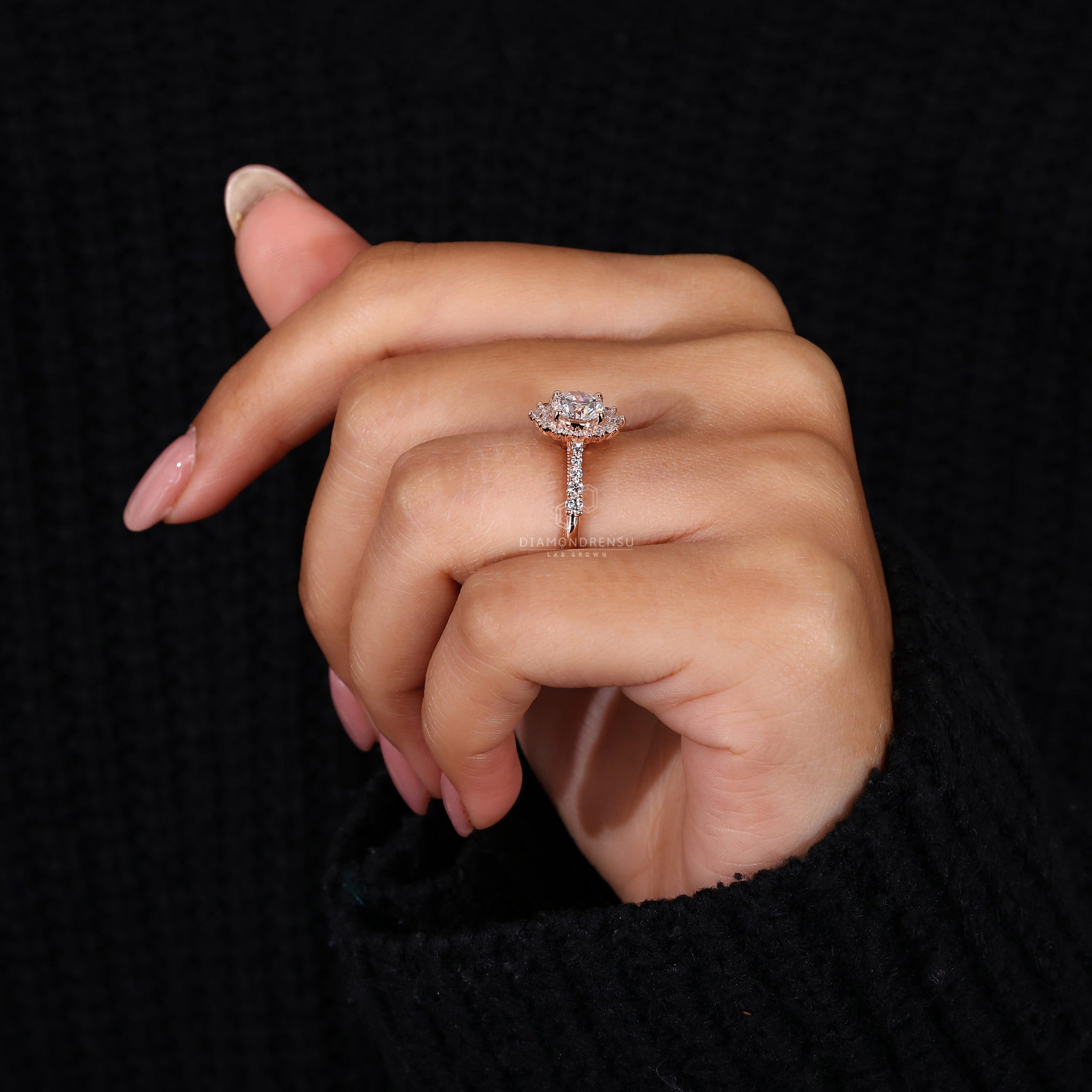 Handmade round diamond ring with prong setting.